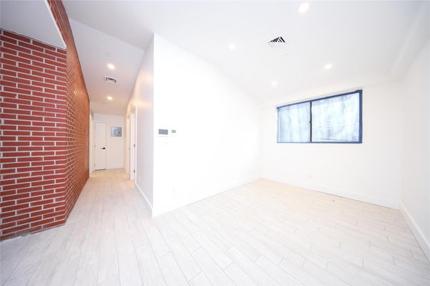 Empty room, Interior, Recessed Lighting, Stone Walls, Wooden Beams, Wood Texture Flooring