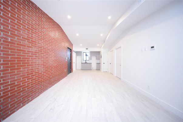 Empty room, Interior, Recessed Lighting, Stone Walls, Wood Texture Flooring