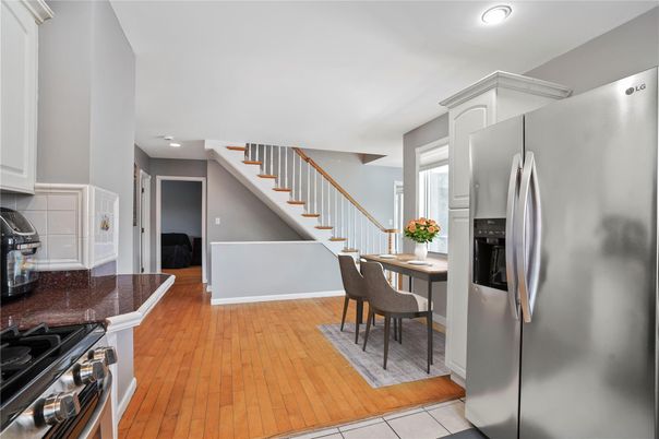 Dining room, Interior, Kitchen, Recessed Lighting, Stainless Steel Appliances, Wood Texture Flooring
