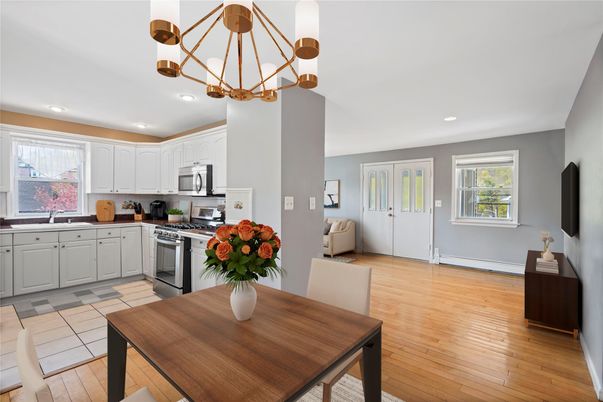 Dining room, Interior, Kitchen, Pendant Lights, Recessed Lighting, Stainless Steel Appliances, Wood Texture Flooring