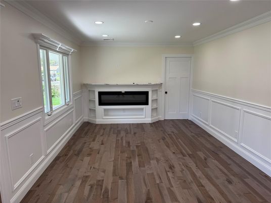 Empty room, Fireplace, Interior, Recessed Lighting, Wood Texture Flooring