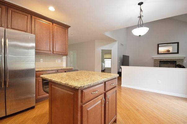 Fireplace, Interior, Kitchen, Pendant Lights, Recessed Lighting, Stainless Steel Appliances, Wood Texture Flooring