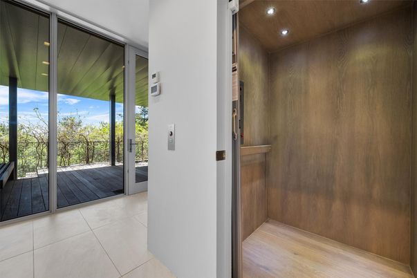 Elevator, Interior, Recessed Lighting, Wood Texture Flooring, Wooden Walls