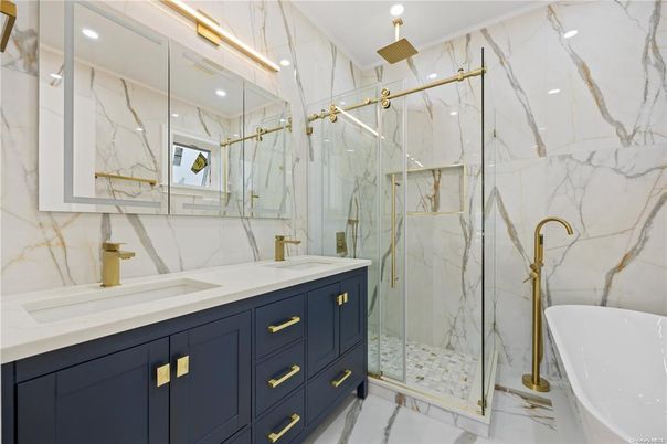 Bathroom, Dual Sink Vanities, Free Standing Baths, Glass Shower, Interior, Marble, Marble Walls, Recessed Lighting