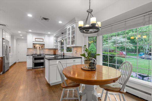 Dining room, Interior, Kitchen, Pendant Lights, Recessed Lighting, Stainless Steel Appliances, Wood Texture Flooring