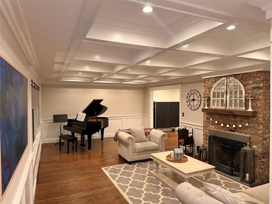 Fireplace, Interior, Living room, Piano, Recessed Lighting, Stone Walls, Wood Texture Flooring