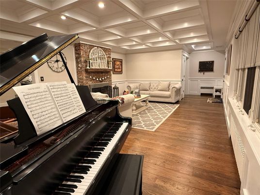 Fireplace, Interior, Living room, Piano, Recessed Lighting, Wood Texture Flooring