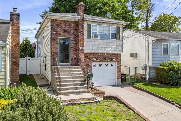 Attached, Exterior, Facade, Brick Facade, Raised Ranch