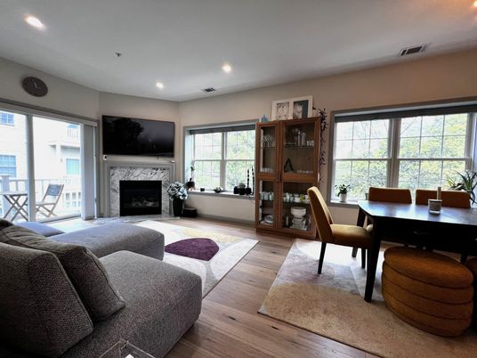 Dining room, Fireplace, Interior, Living room, Recessed Lighting, Wood Texture Flooring