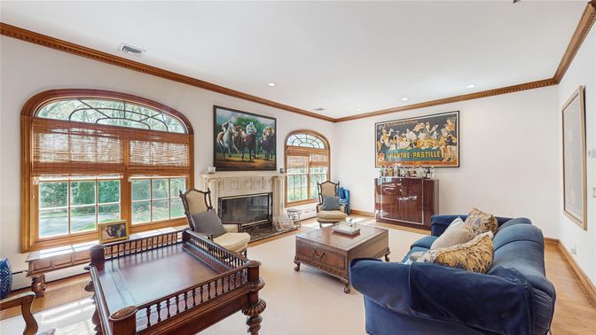 Fireplace, Game Room, Interior, Living room, Recessed Lighting, Wood Texture Flooring