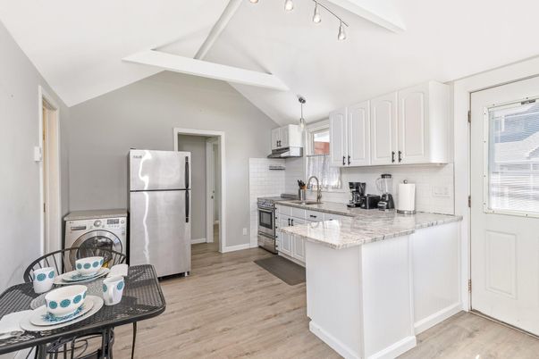 Interior, Kitchen, Pendant Lights, Washer, Wood Texture Flooring