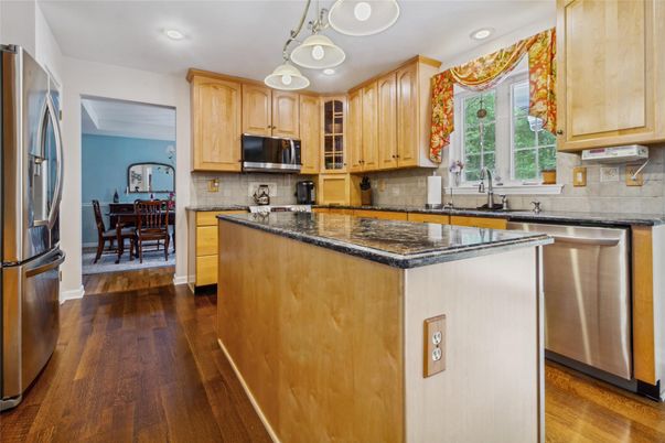 Dining room, Interior, Kitchen, Recessed Lighting, Stainless Steel Appliances, Wood Texture Flooring