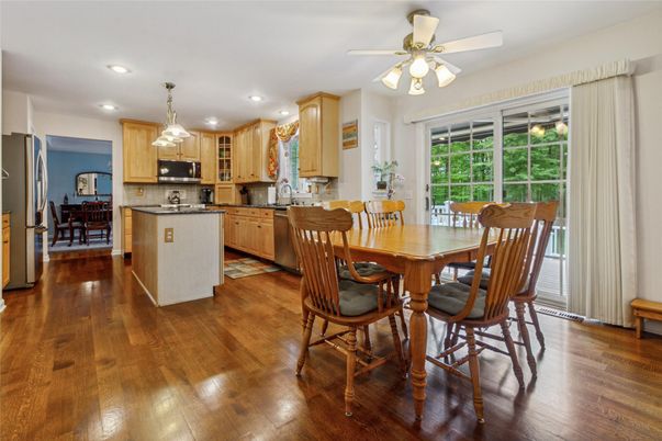 Dining room, Interior, Kitchen, Pendant Lights, Recessed Lighting, Stainless Steel Appliances, Wood Texture Flooring