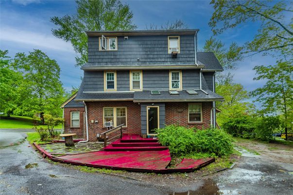 Exterior, Facade, Brick Facade, American Foursquare