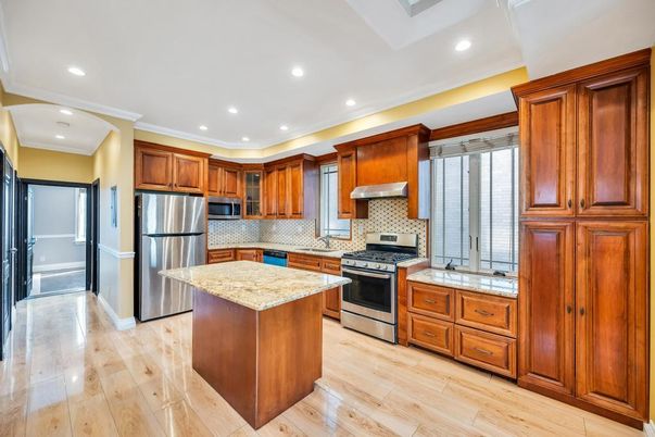 Interior, Kitchen, Recessed Lighting, Stainless Steel Appliances, Wood Texture Flooring