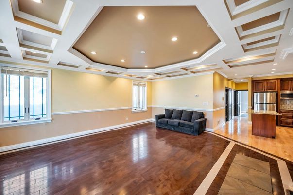 Empty room, Interior, Kitchen, Recessed Lighting, Stainless Steel Appliances, Wood Texture Flooring