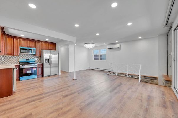 Chandelier, Dining room, Interior, Kitchen, Recessed Lighting, Stainless Steel Appliances, Wood Texture Flooring