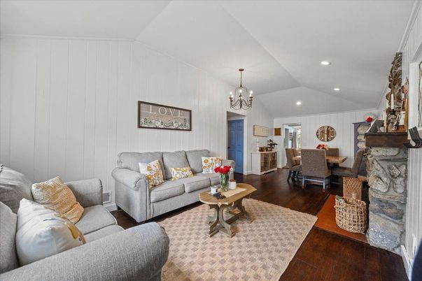 Chandelier, Dining room, Fireplace, Interior, Living room, Recessed Lighting, Wood Texture Flooring