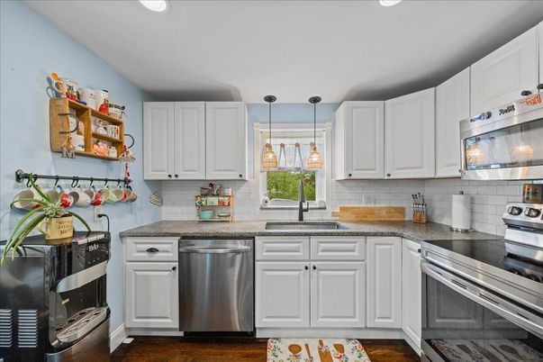 Interior, Kitchen, Pendant Lights, Recessed Lighting, Stainless Steel Appliances, Wood Texture Flooring