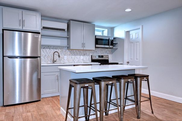 Interior, Kitchen, Recessed Lighting, Stainless Steel Appliances, Wood Texture Flooring
