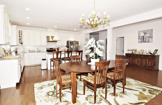 Chandelier, Dining room, Interior, Kitchen, Pendant Lights, Recessed Lighting, Stainless Steel Appliances, Wood Texture Flooring