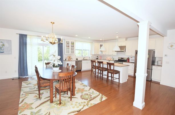 Chandelier, Dining room, Interior, Kitchen, Pendant Lights, Recessed Lighting, Stainless Steel Appliances, Wood Texture Flooring