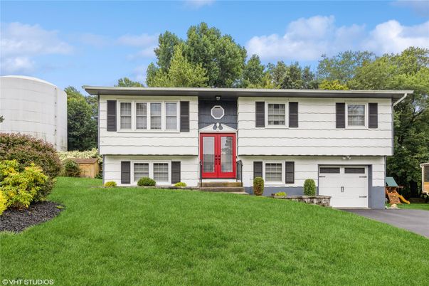 Attached, Exterior, Facade, Raised Ranch