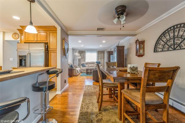 Dining room, Interior, Kitchen, Living room, Pendant Lights, Recessed Lighting, Stainless Steel Appliances, Wood Texture Flooring