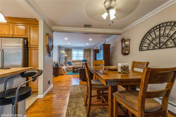 Dining room, Interior, Kitchen, Living room, Recessed Lighting, Stainless Steel Appliances, Wood Texture Flooring