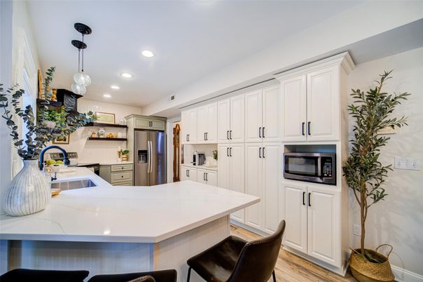 Interior, Kitchen, Pendant Lights, Recessed Lighting, Stainless Steel Appliances, Wood Texture Flooring