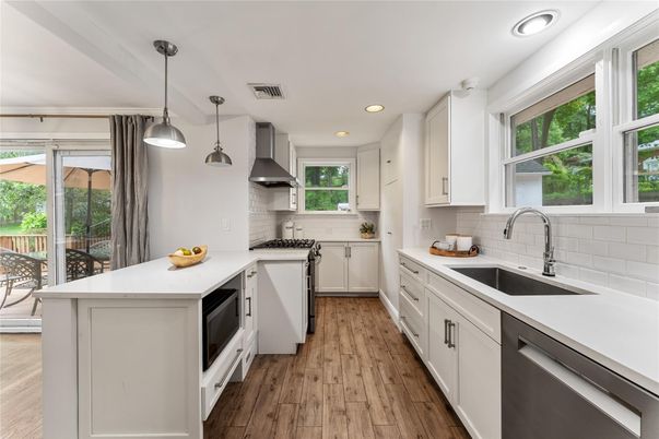 Interior, Kitchen, Pendant Lights, Recessed Lighting, Stainless Steel Appliances, Wood Texture Flooring