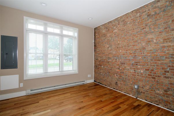 Empty room, Interior, Recessed Lighting, Stone Walls, Wood Texture Flooring
