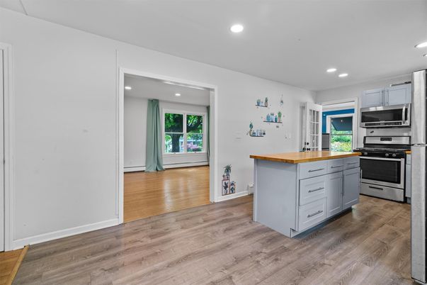 Interior, Kitchen, Recessed Lighting, Stainless Steel Appliances, Wood Texture Flooring