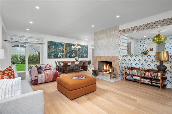 Chandelier, Dining room, Fireplace, Interior, Living room, Pendant Lights, Recessed Lighting, Wood Texture Flooring