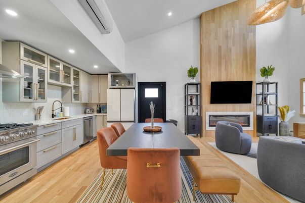 Dining room, Fireplace, Interior, Kitchen, Living room, Recessed Lighting, Stainless Steel Appliances, Wood Texture Flooring