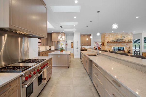 Fireplace, Interior, Kitchen, Pendant Lights, Recessed Lighting, Stainless Steel Appliances, Stone Walls