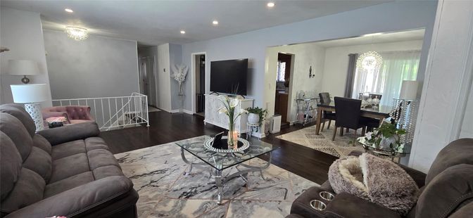 Chandelier, Dining room, Fireplace, Interior, Living room, Recessed Lighting, Wood Texture Flooring