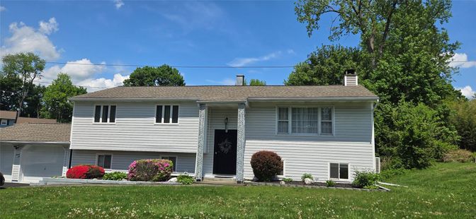 Attached, Exterior, Facade, Raised Ranch
