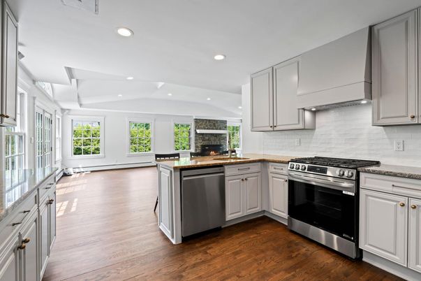 Fireplace, Interior, Kitchen, Recessed Lighting, Stainless Steel Appliances, Wood Texture Flooring