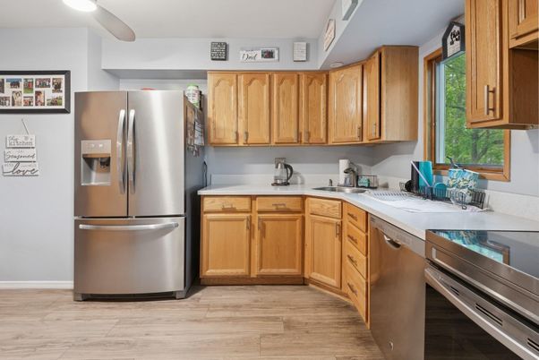 Interior, Kitchen, Recessed Lighting, Stainless Steel Appliances, Wood Texture Flooring