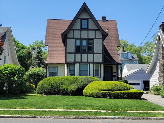 Attached, Exterior, Facade, Tudor Revival