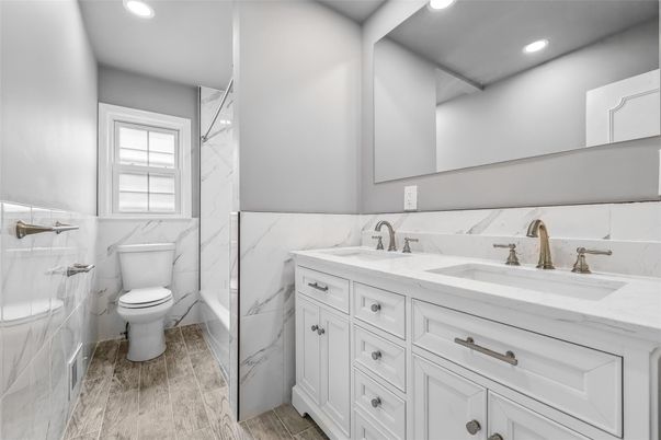 Bathroom, Dual Sink Vanities, Interior, Marble Walls, Recessed Lighting