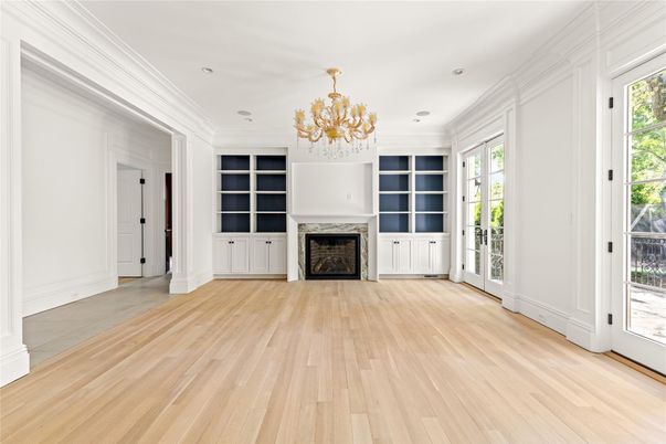Chandelier, Empty room, Fireplace, Interior, Recessed Lighting, Wood Texture Flooring