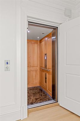 Elevator, Interior, Recessed Lighting, Wood Texture Flooring, Wooden Walls