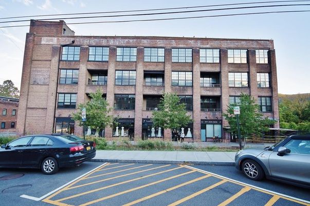 Exterior, Facade, Brick Facade, Condo Building