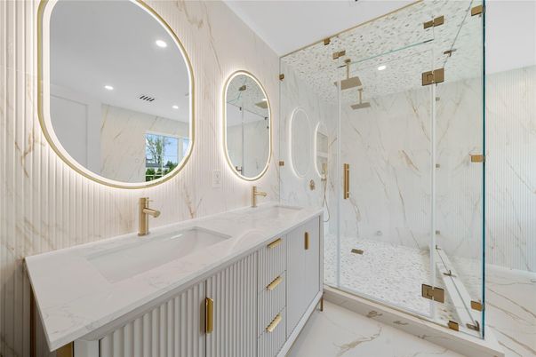 Bathroom, Dual Sink Vanities, Glass Shower, Interior, Marble, Marble Walls, Recessed Lighting
