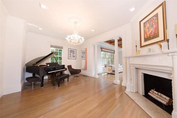 Chandelier, Fireplace, Interior, Piano, Recessed Lighting, Wood Texture Flooring