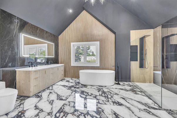 Bathroom, Dual Sink Vanities, Free Standing Baths, Interior, Marble, Recessed Lighting, Wooden Walls