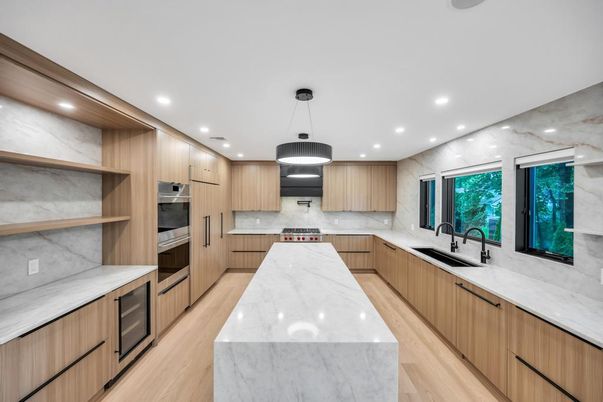Interior, Kitchen, Marble Walls, Pendant Lights, Recessed Lighting, Stainless Steel Appliances, Wood Texture Flooring