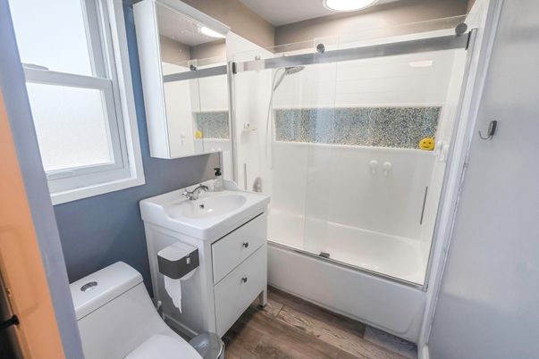 Bathroom, Glass Shower, Interior, Recessed Lighting, Wood Texture Flooring